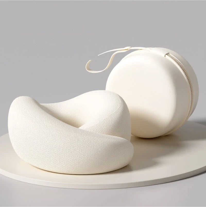 Calmyo memory foam travel pillow in beige with its matching round zip case