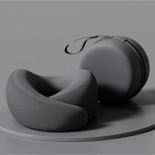 Calmyo memory foam travel pillow in black with its matching round zip case